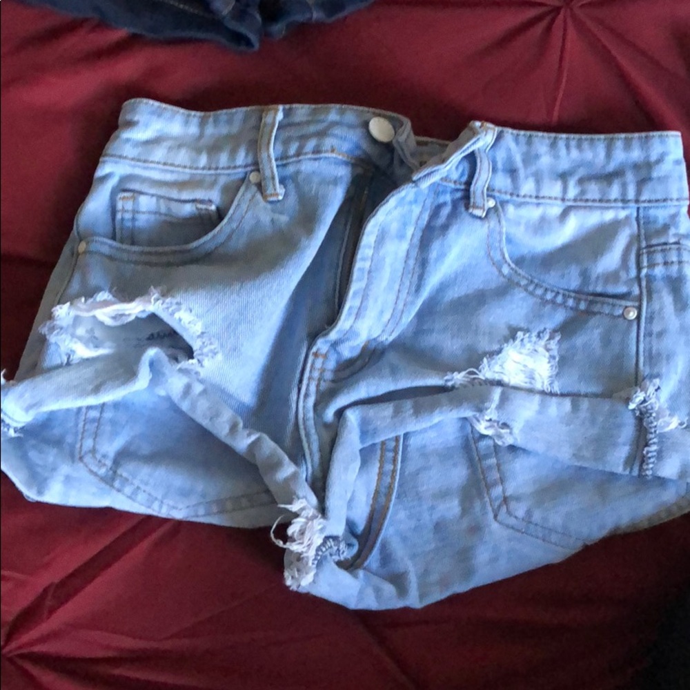 Light distressed shorts